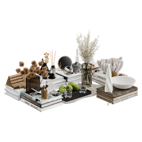 A decorative set with apples and many books.