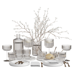 Table setting with branches in a vase.