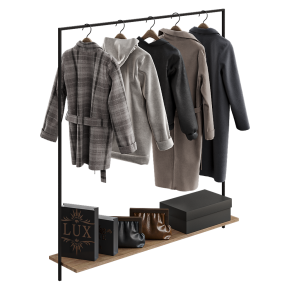 Floor-standing coat rack with outerwear.