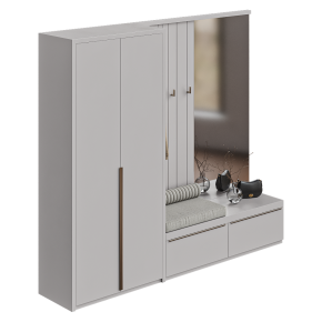 An entryway with a wardrobe and a mirror.
