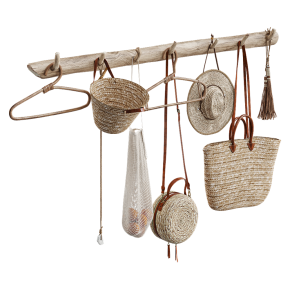 Wall-mounted coat rack with bags and hats.