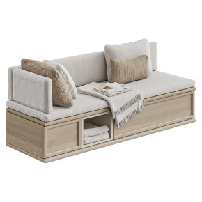 A sofa by the window with a cushion.