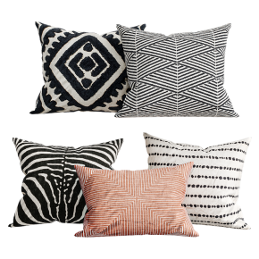 Beige and black decorative cushions.