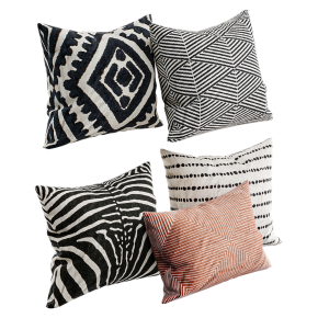 Beige and black decorative cushions.