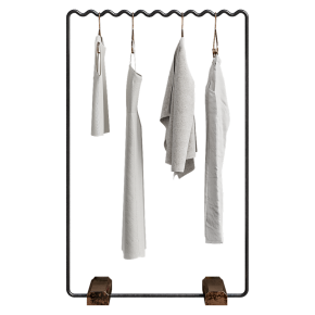 Floor-standing clothes rack with women's clothing.