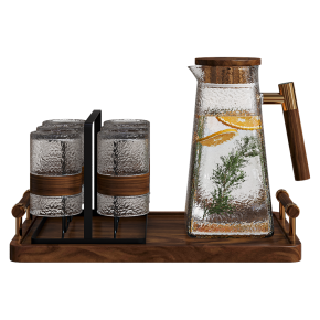 A decorative kitchen set with a decanter and glasses.