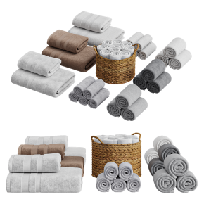 The towels are rolled up and in the basket.